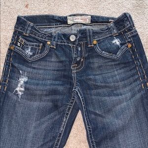 Embroidered back pocket MEK jeans